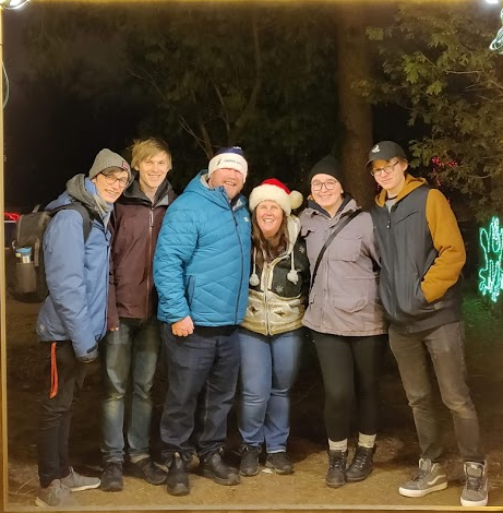 Dad, step-mom, sister, Andrew, Tomas, and I; Christmas 2018